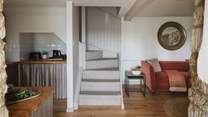 Take the stairs to uncover two equally beautiful bedrooms...