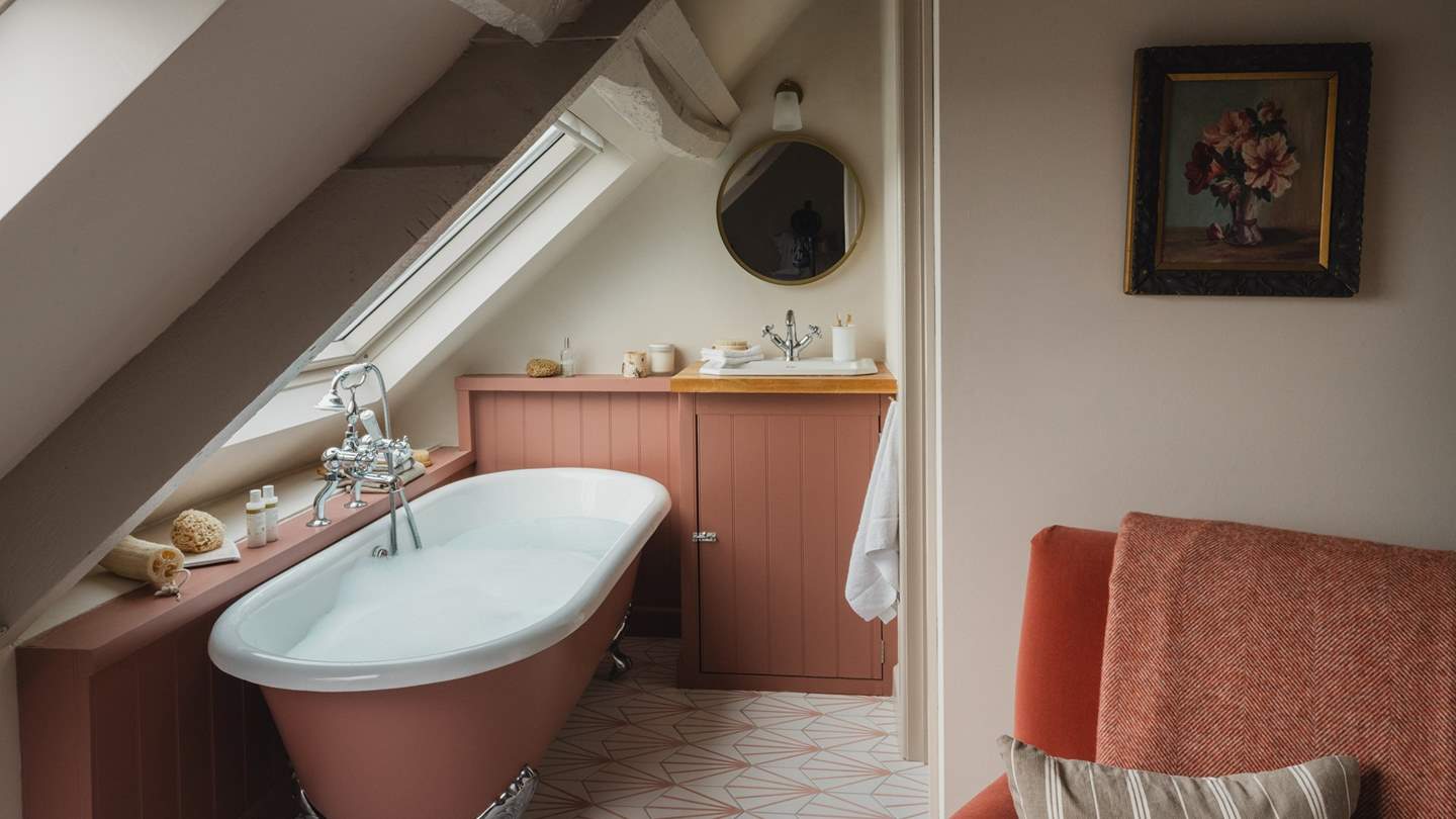 Seek soothing self-care moments in this blush-hued space