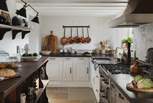 Make use of the abundant worktop space and accoutrements for kitchen creativity