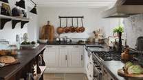 Make use of the abundant worktop space and accoutrements for kitchen creativity