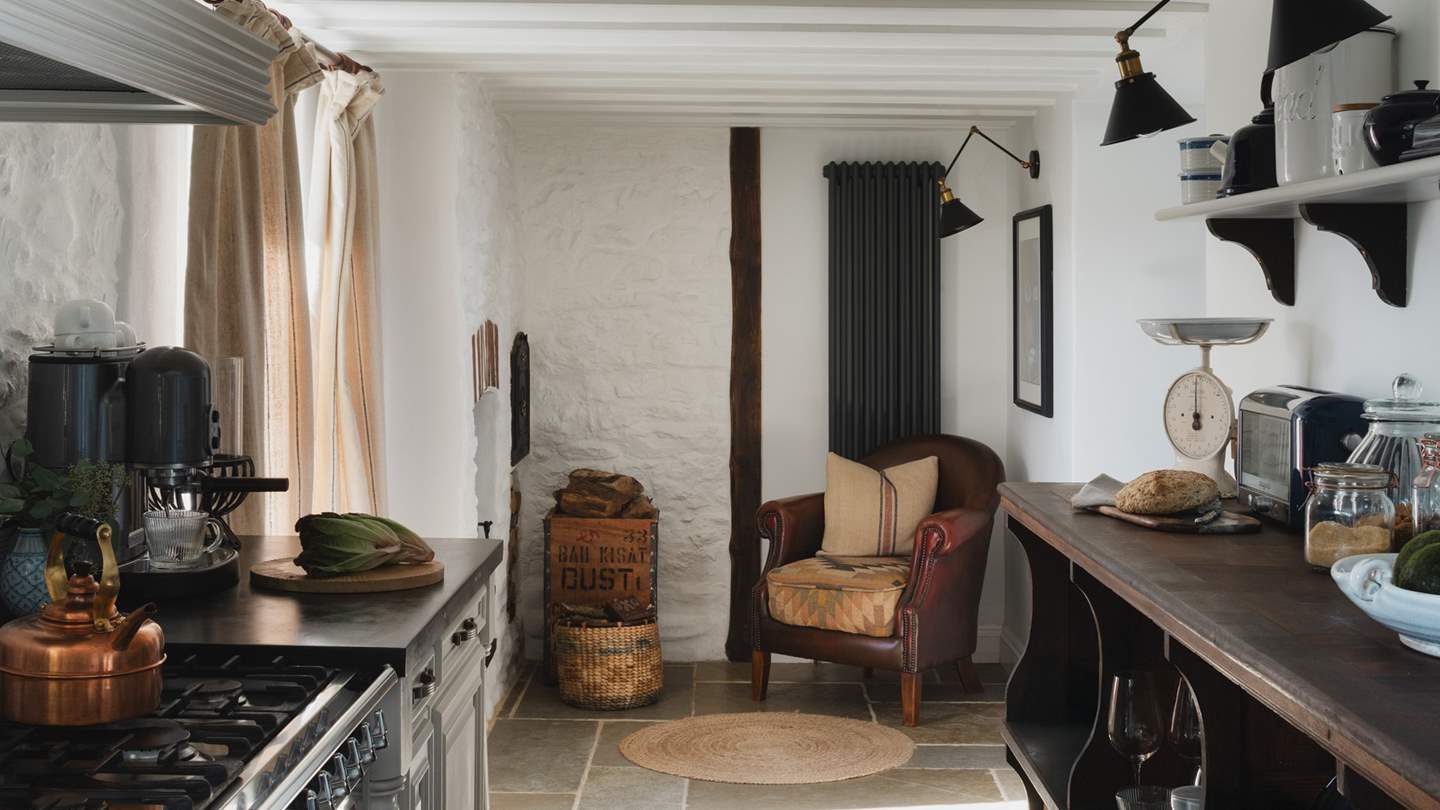 Fall in love with its original flagstone floors, tailored cabinetry and antique touches