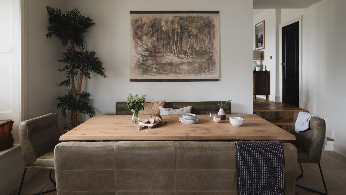 There’s plenty of space for eight to dine and relax around the modern dining table