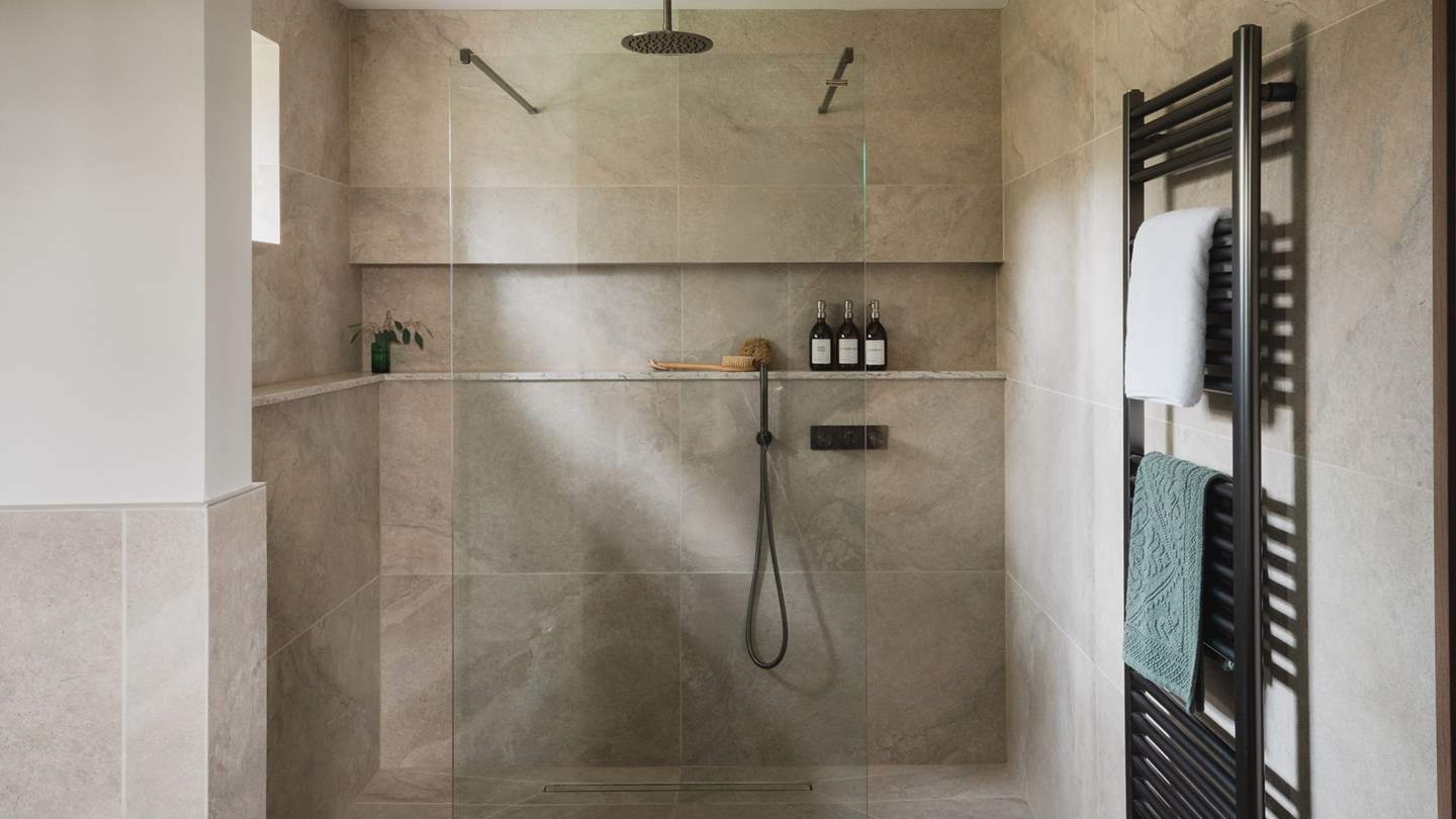 The dual shower invites indulgent rainfall moments to share