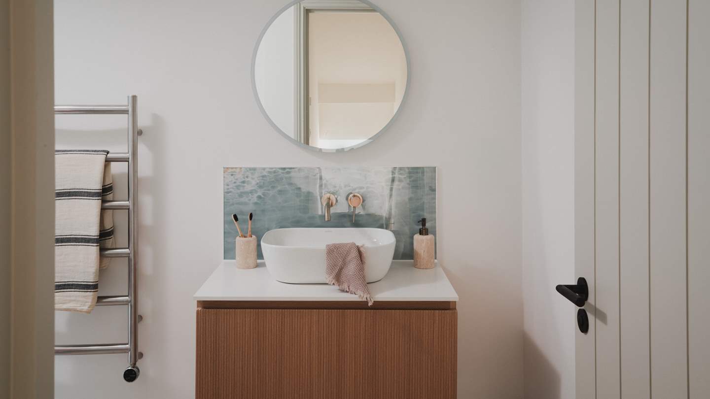 There’s also a heated towel rail to keep towels fluffy and warm