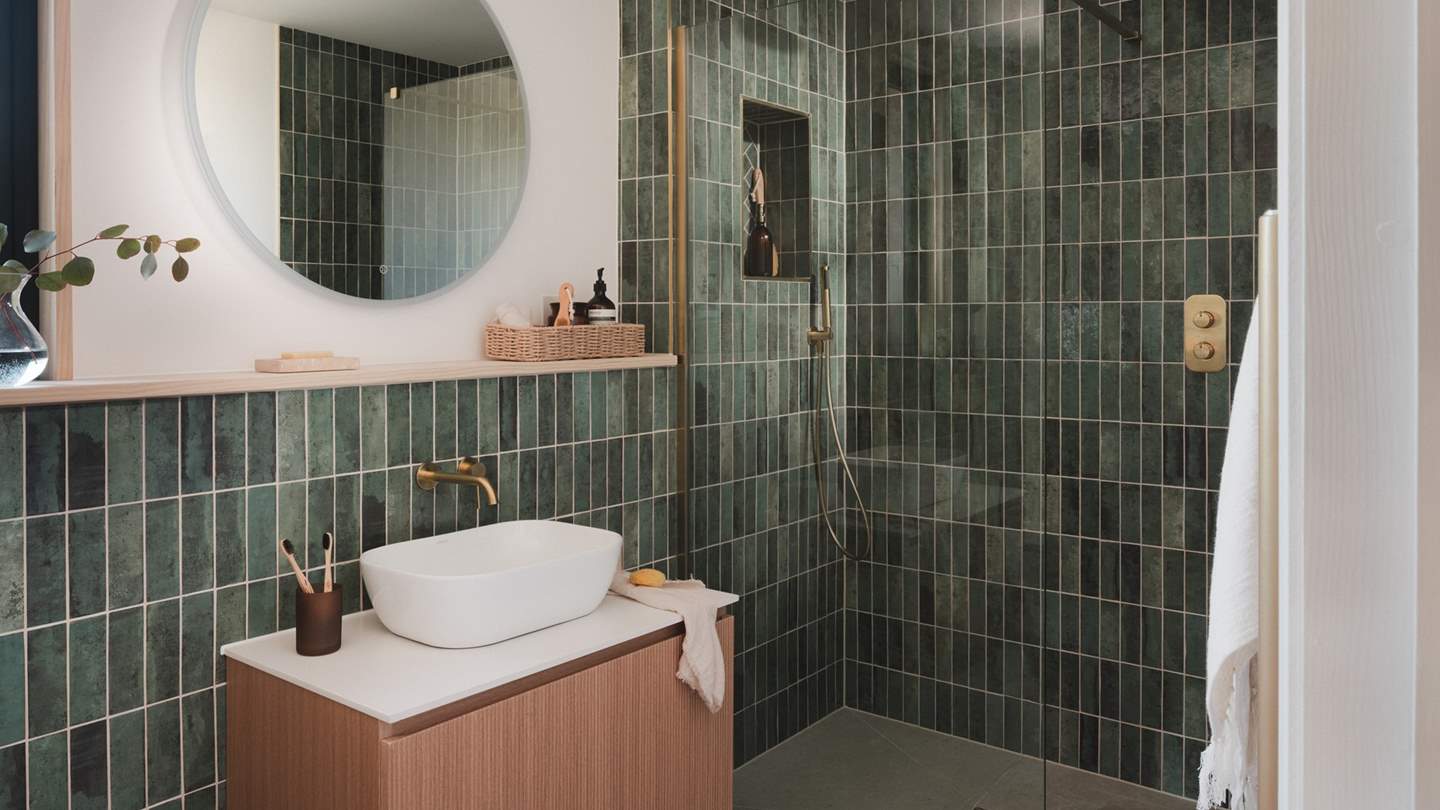 A large rainfall shower invites spa-like serenity