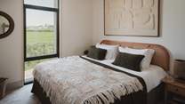 Beside bedroom four, you’ll find the fifth bedroom