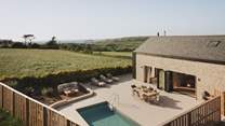 Designed with the very best of outdoor living in mind, step outside to uncover a contemporary coastal paradise