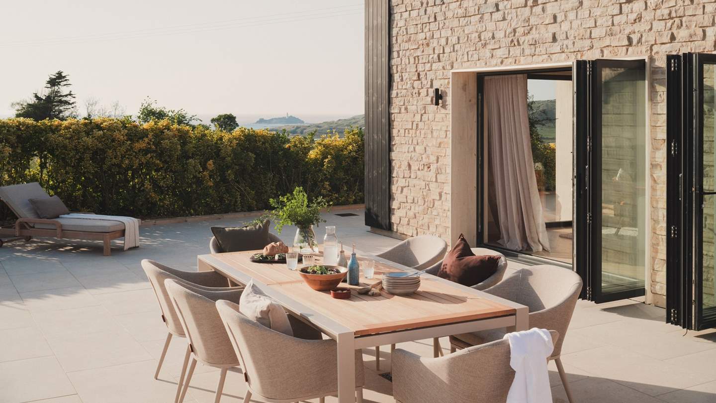 Spend sun-soaked days alfresco with the bi-fold doors fully extended