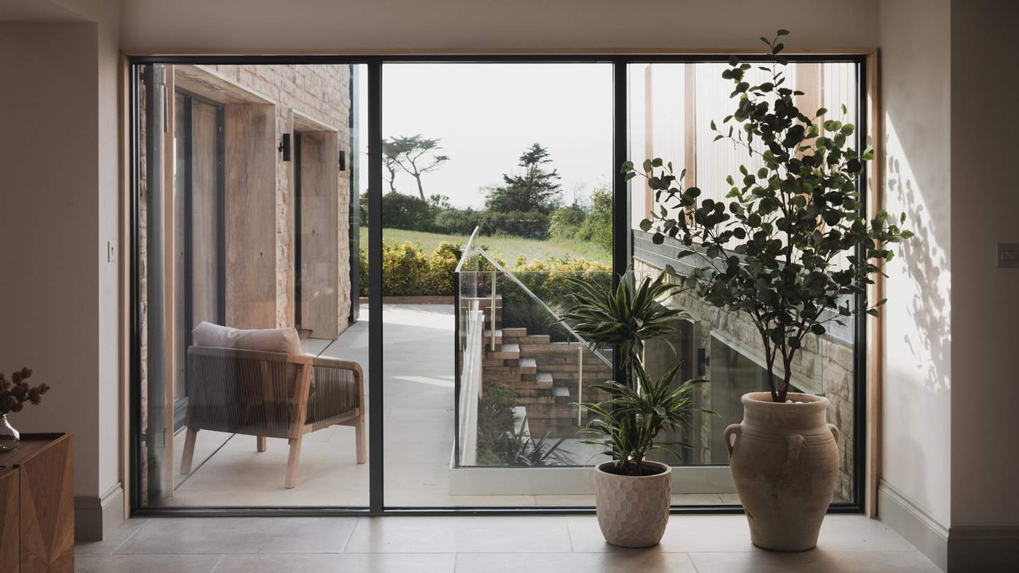 Contemporary coastal calm awaits for ten 