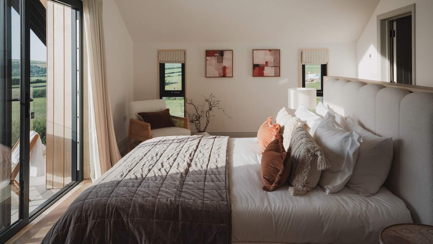 The master bedroom features a decadent super king bed