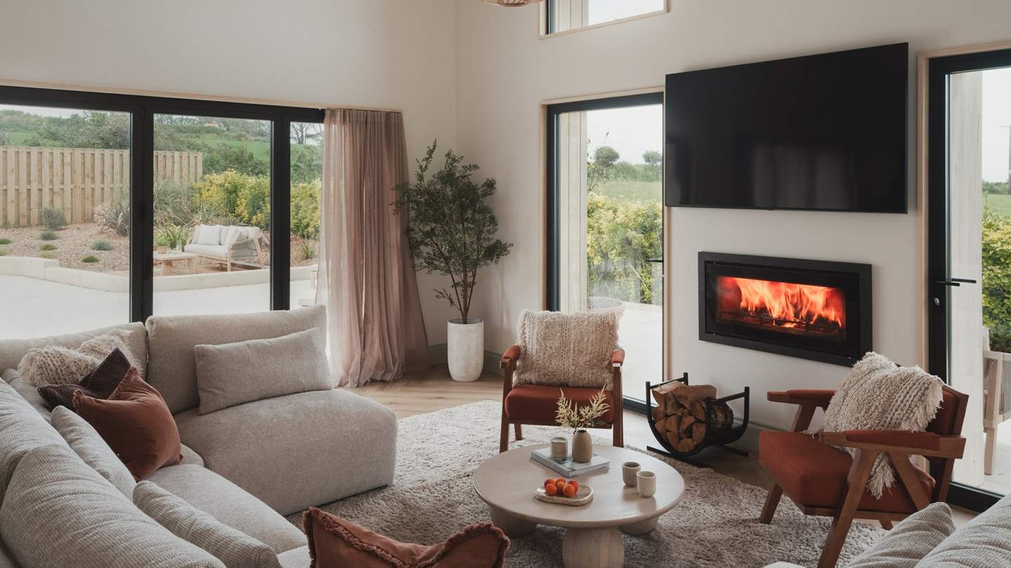 Recline on the generous sofa and settle in for cosy evenings in front of the Smart TV