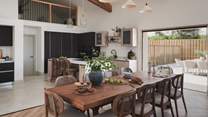 An inviting dining table comfortably seats ten for long, leisurely suppers, where conversation flows effortlessly into the evening...