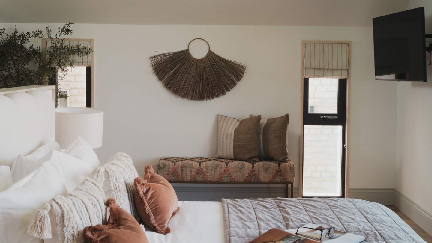 Set on the ground floor, it offers a dreamy outlook across countryside and coast