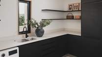 In a separate utility room, you’ll find a washing machine and tumble dryer