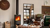 Cosy  up for fireside evenings beside the wood burning stove...