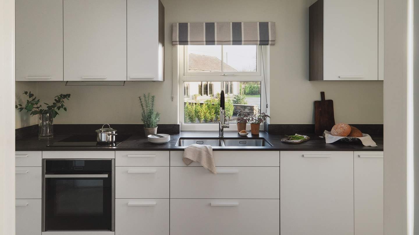 For those who may wish to entertain or host a unique dining experience, there is also a fully-equipped, separate second kitchen