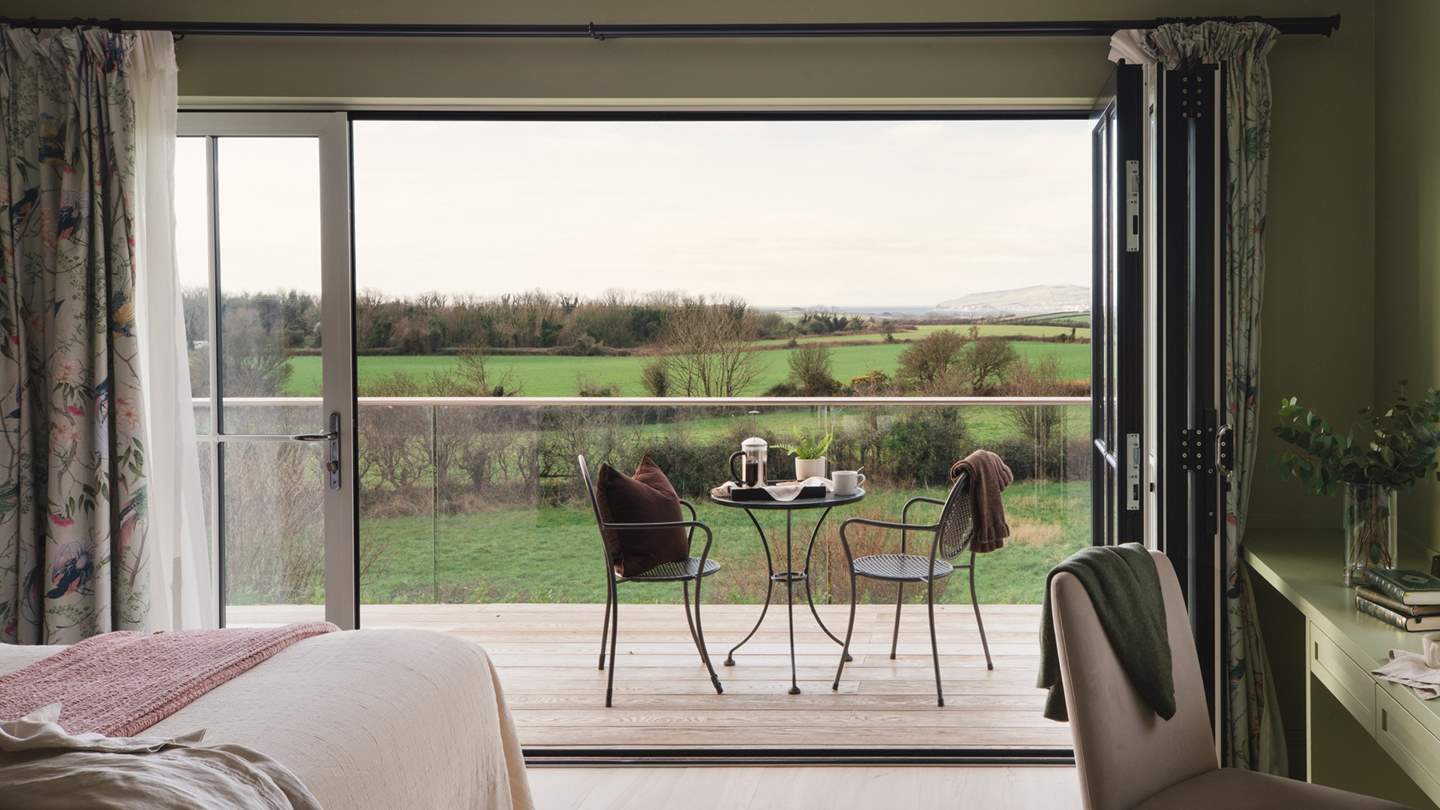 Step out onto the expansive balcony...