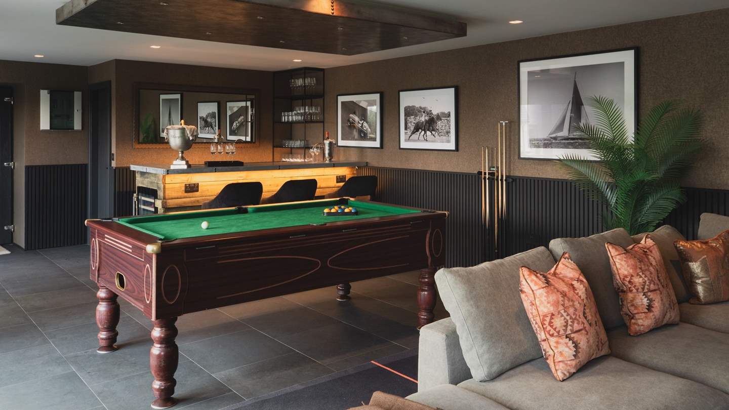 A games room with a bar sets the scene for family staycations and multi-generational escapes
