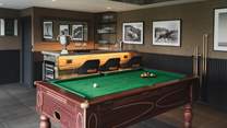 Endless family fun resides around the pool table, whilst the bar is the perfect place to gather for champagne conversation