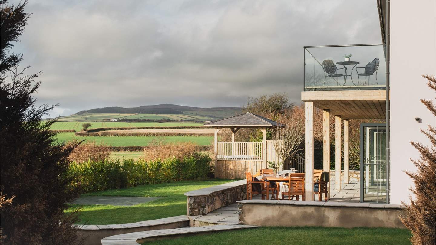 A spacious lawn ensures rural bliss for little ones and adults alike