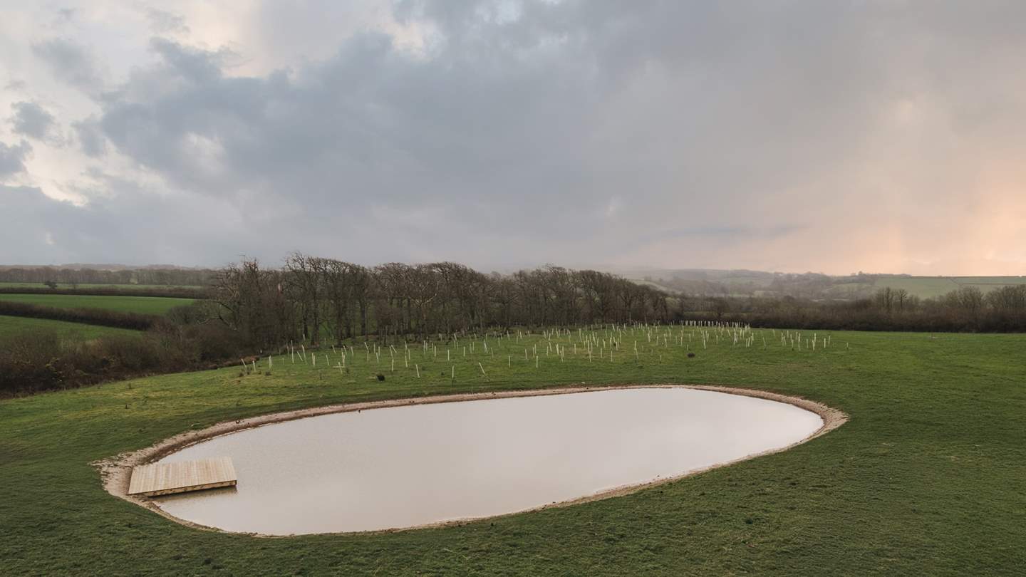 The impressive 50-meter wild swimming lake beckons with its promise of pure exhilaration