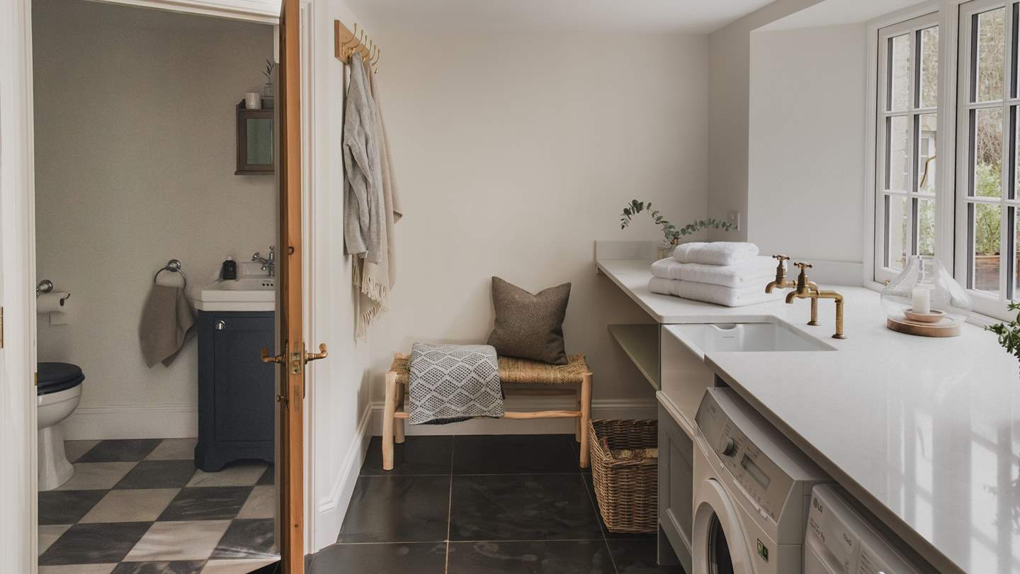 Beside the utility area, you'll find a downstairs shower room