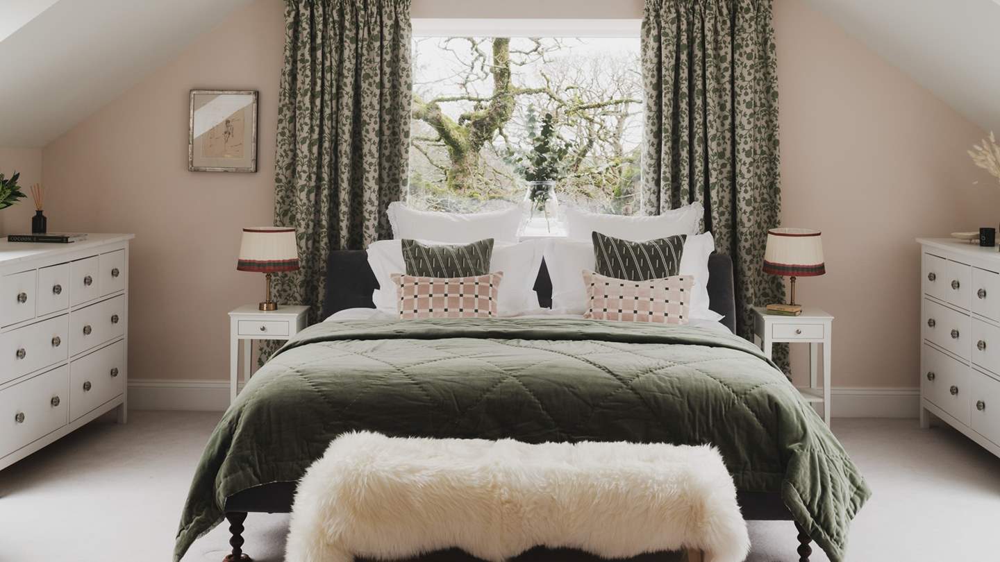 Overlooking the swimming lake, the master bedroom is simply a dream