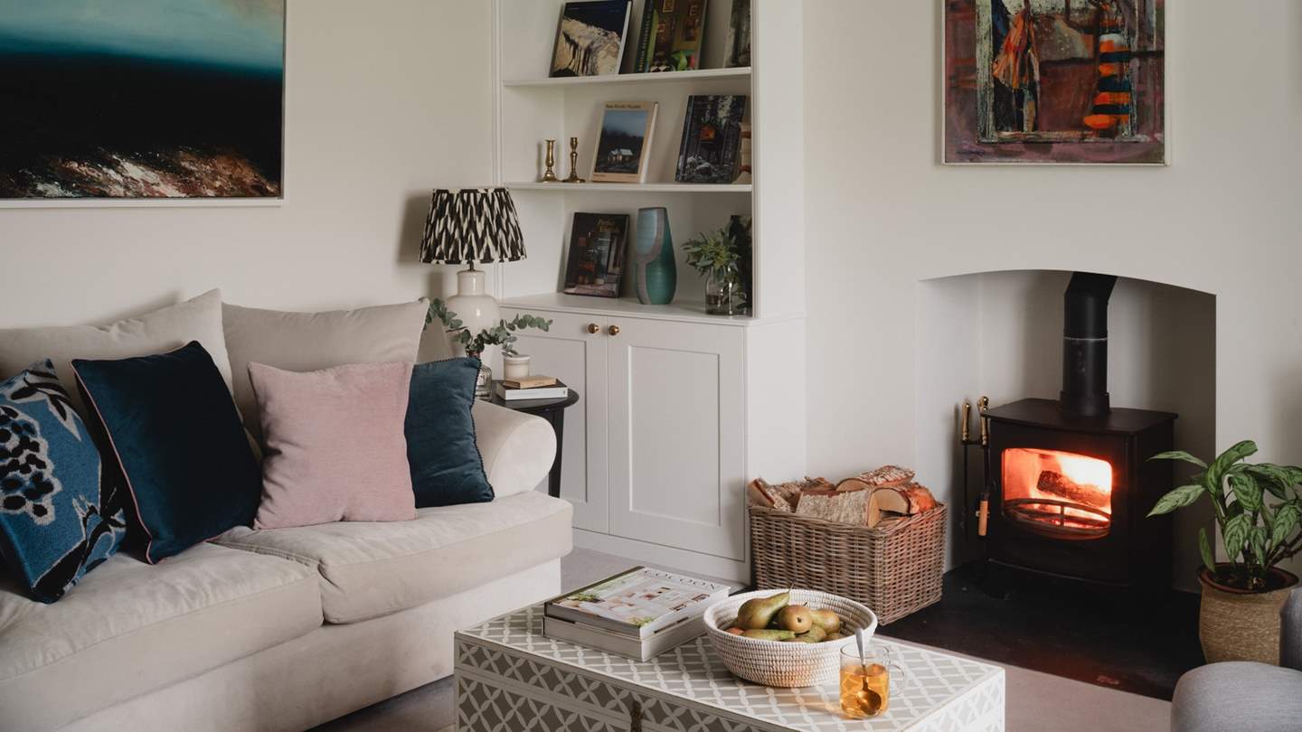 Curl up with your latest page-turner as the warmth of the glowing wood burner embraces the room