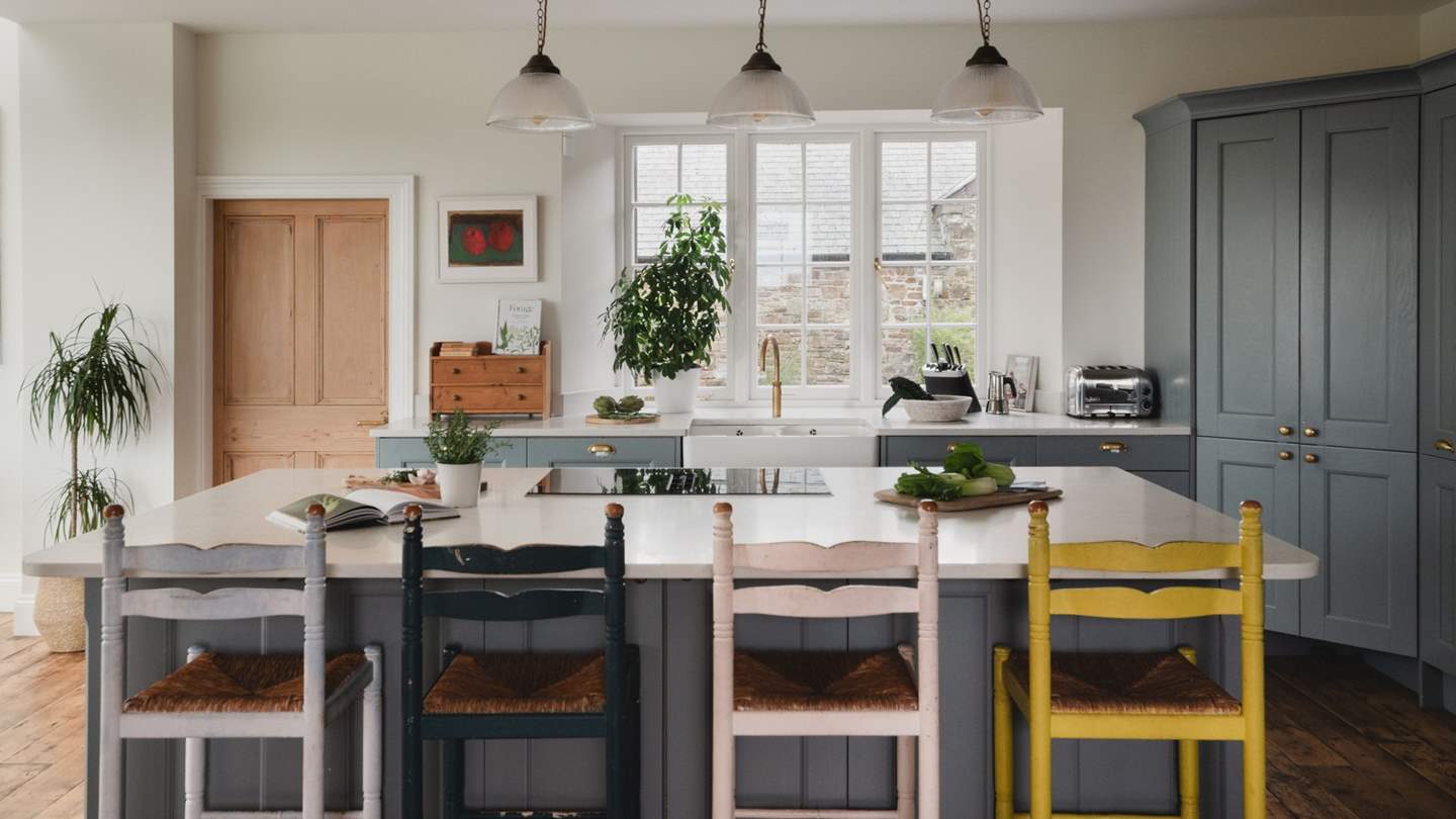 The spacious kitchen is well-equipped with all you could possibly need