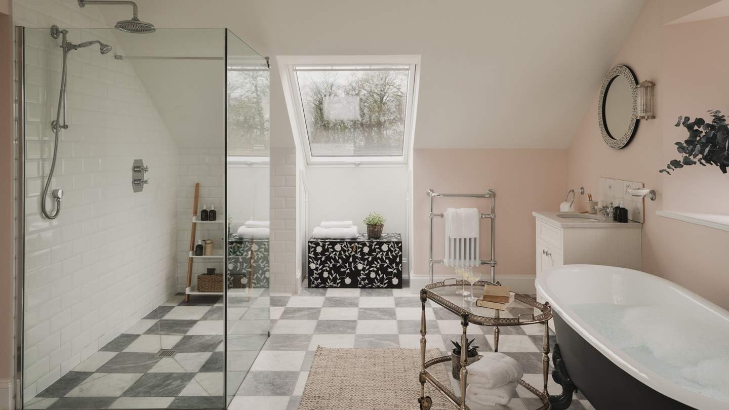 Savour unhurried mornings beneath the rainfall shower and indulgent evening soaks in the freestanding slipper bath