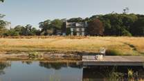The impressive 50-metre lake is a beautiful feature of the grounds, naturally filtered by aquatic plants and reeds