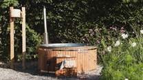 Take a heavenly soak in the wood-fired hot tub 