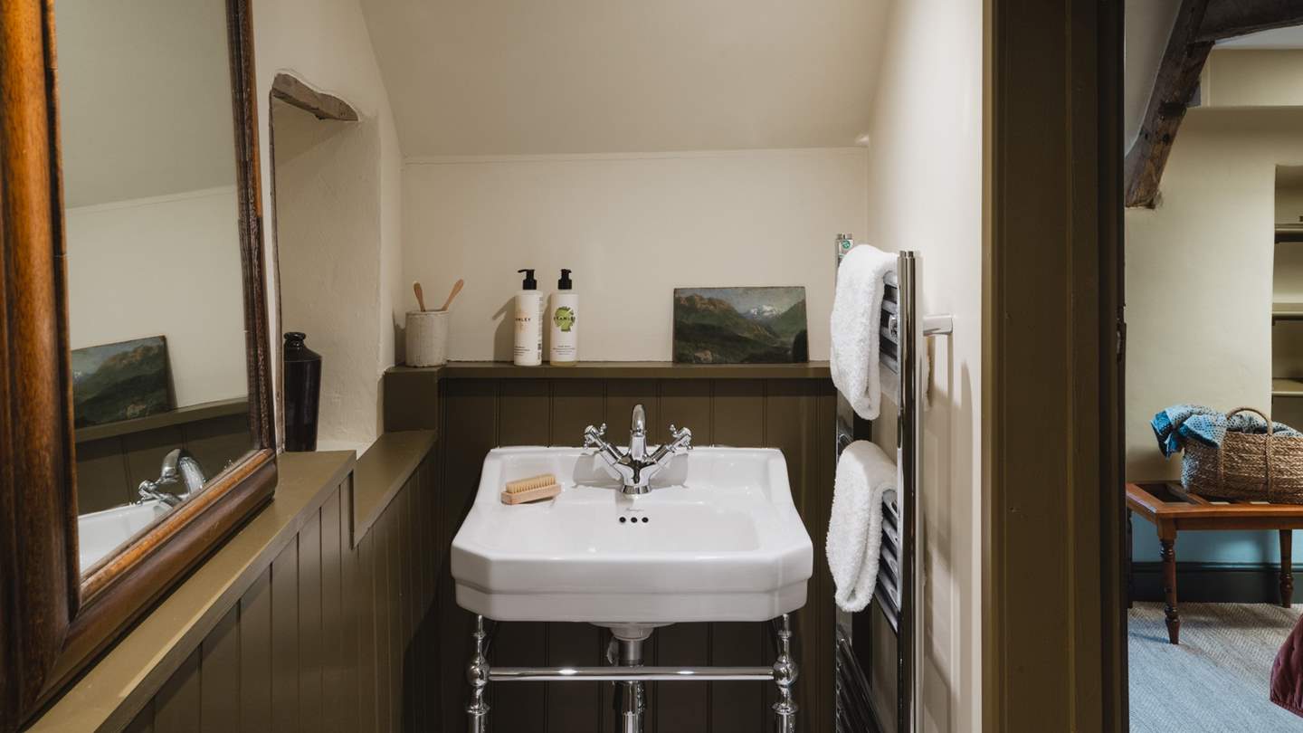 There is a WC and sink next door