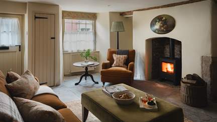 Fireside soirées with your kin await around the cosy wood burning stove...