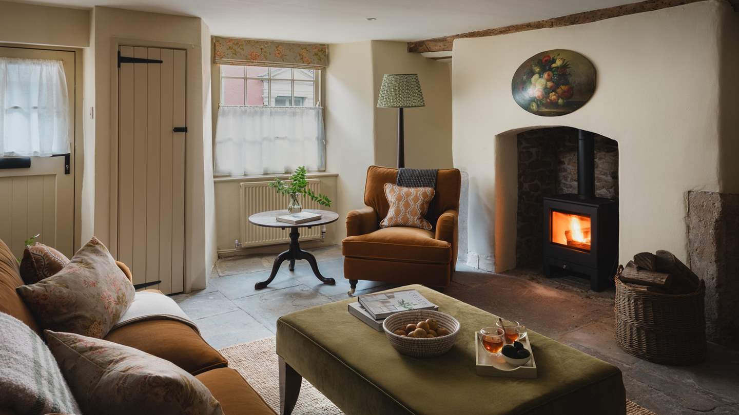 Fireside soirées with your kin await around the cosy wood burning stove...