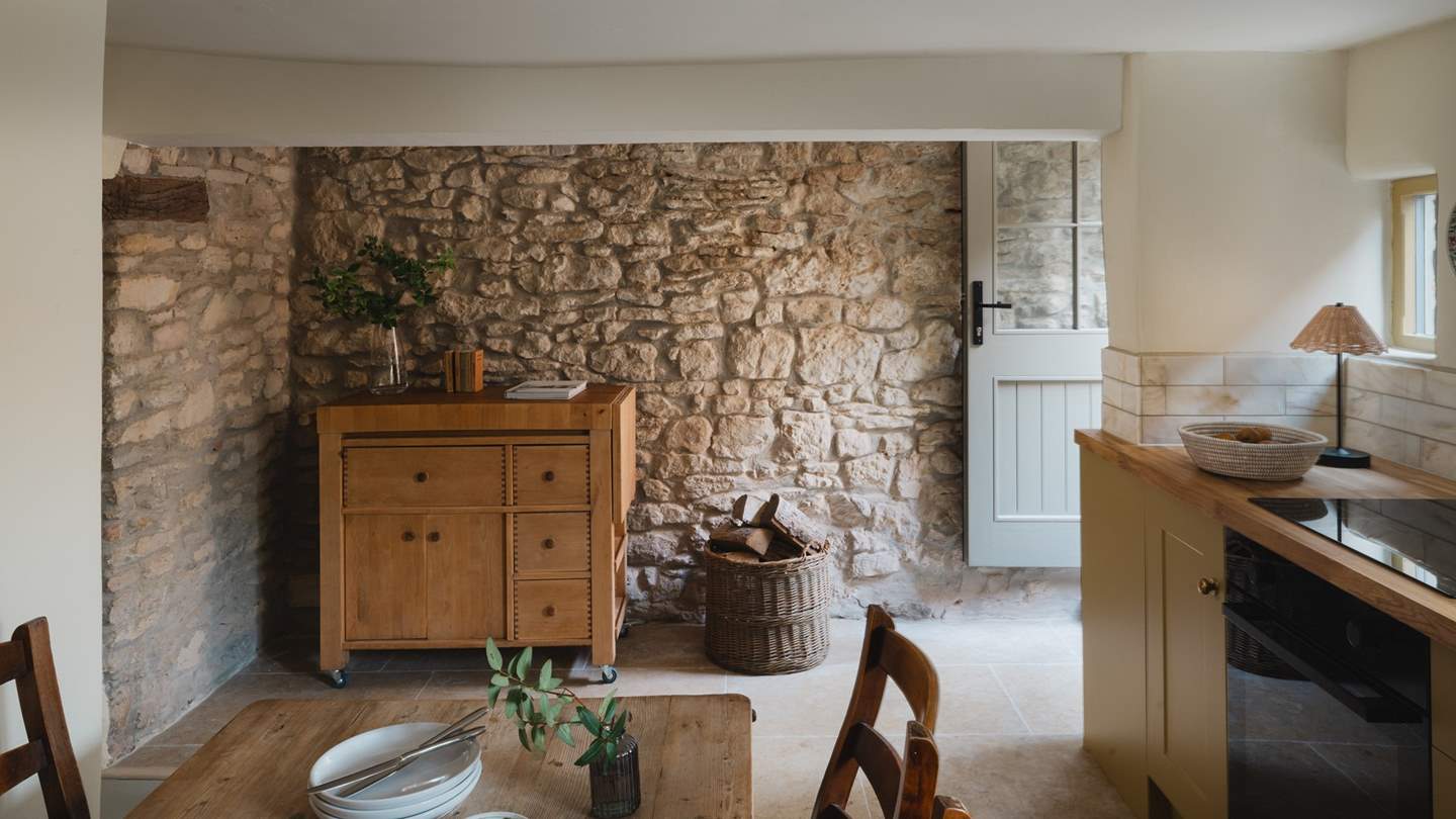 An antique pine table for four sets the scene for romantic feasts at any hour