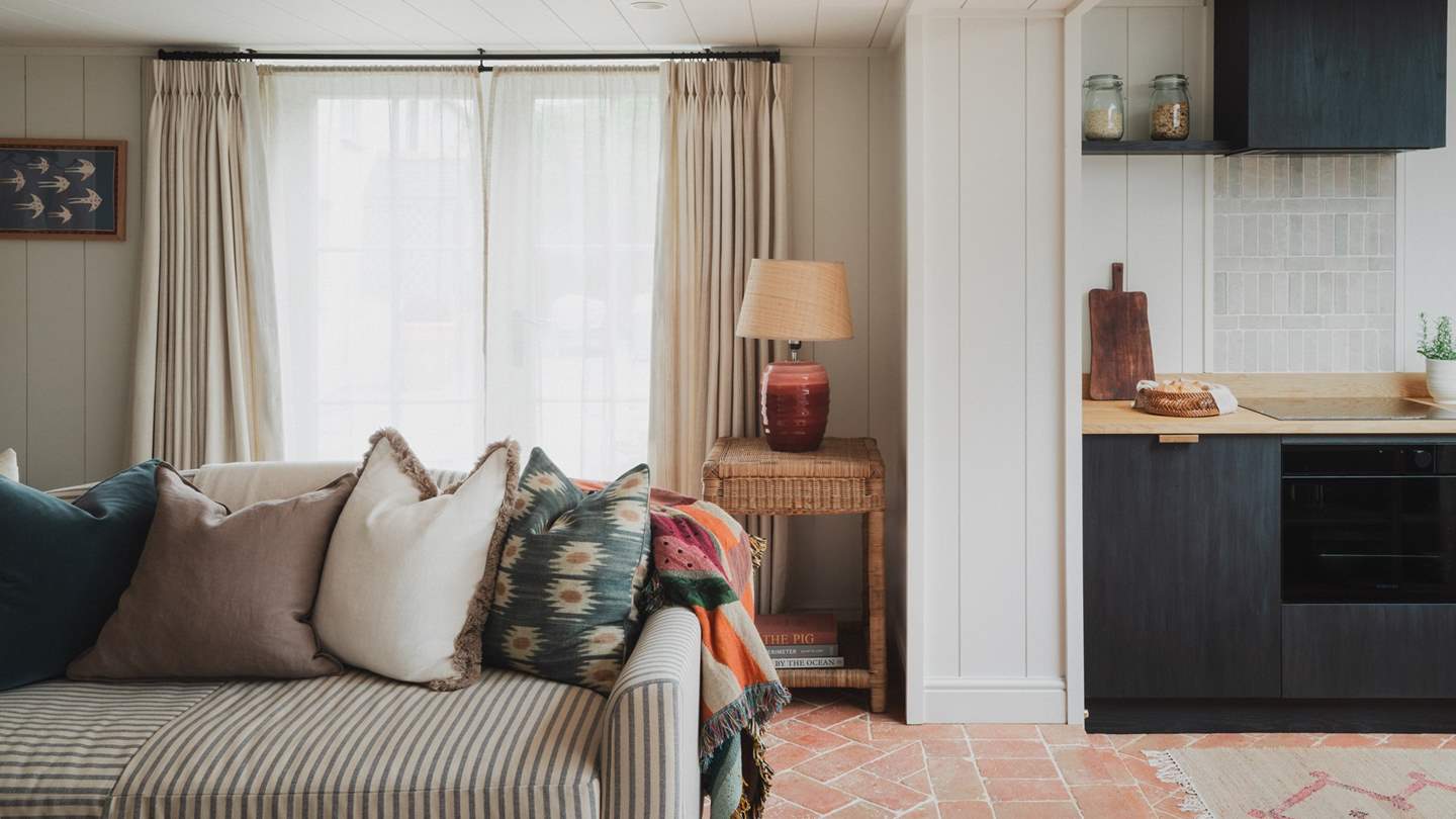 Stretch out in style on the sumptuous striped sofa