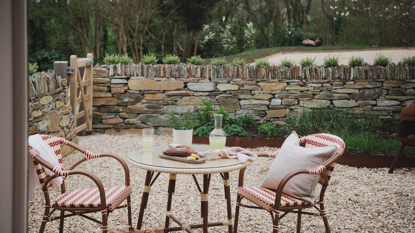 A table and chairs for two set the scene for alfresco paradise