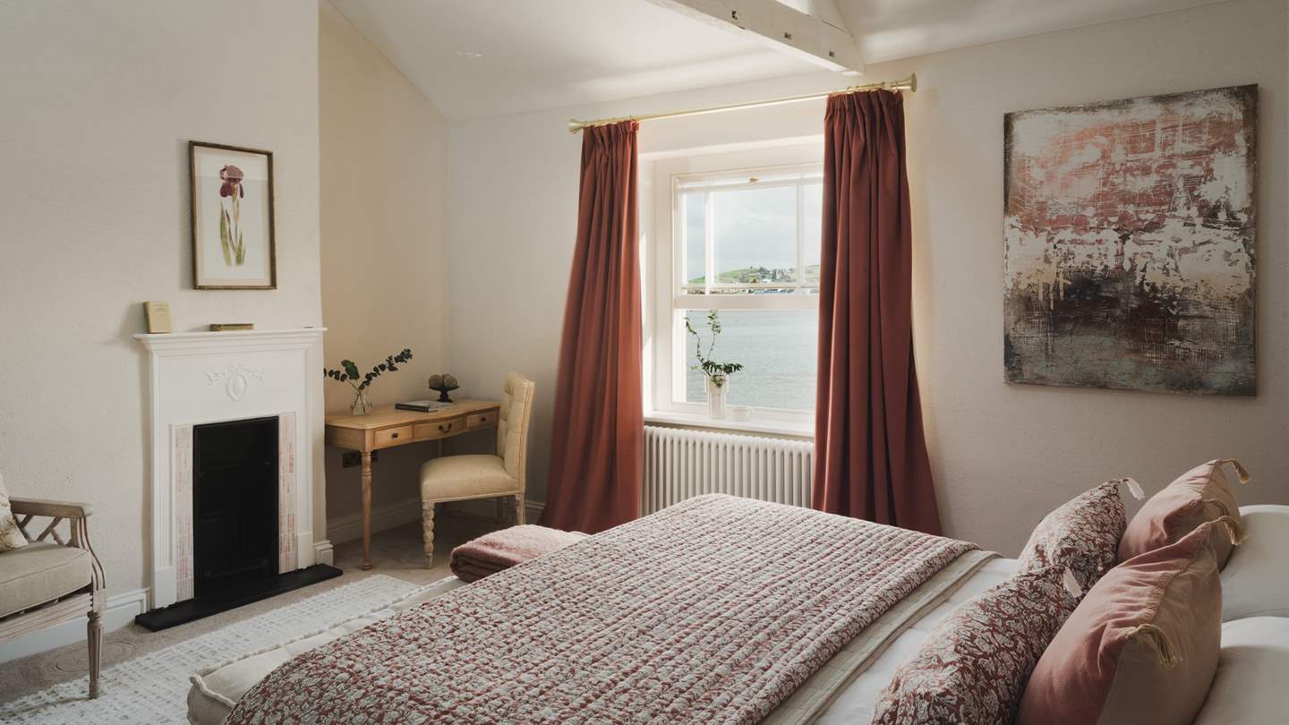 Situated on the quayside overlooking the river mouth, our charming dog-friendly retreat spans three stories