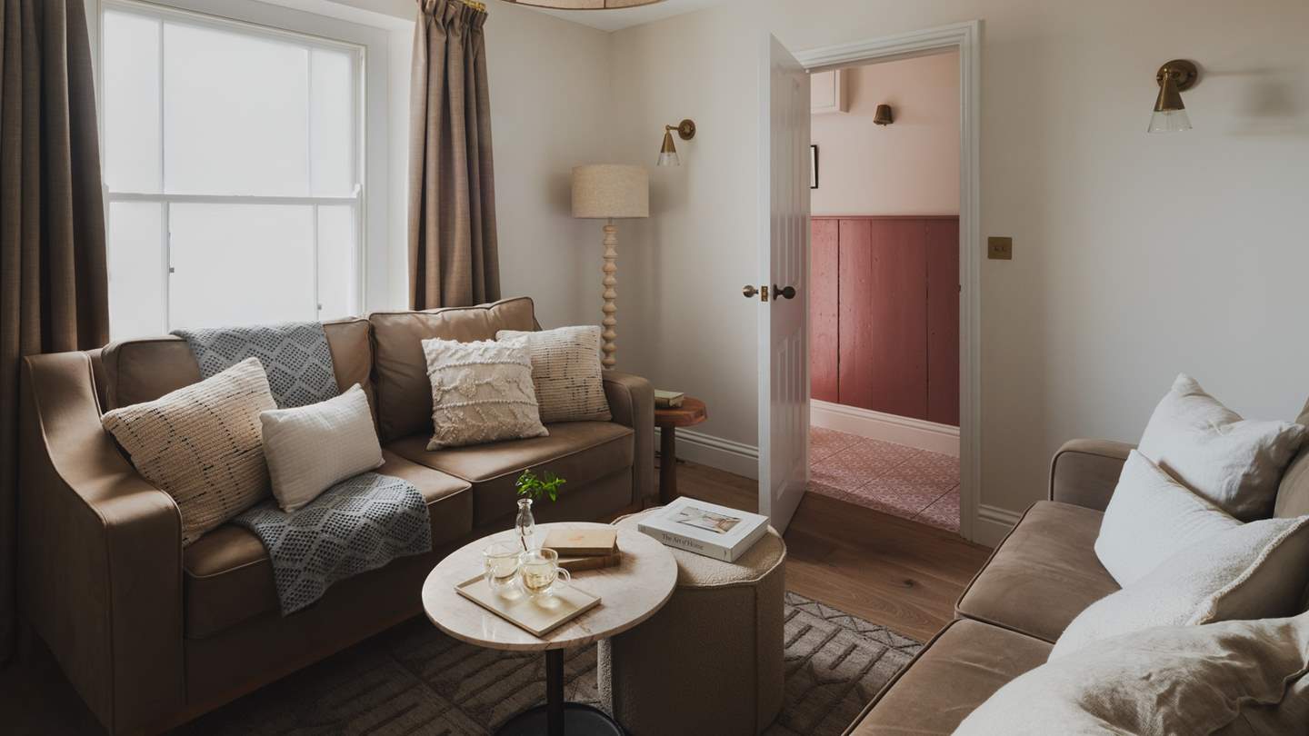 Step through the pretty hallway with reclaimed panelling to find sumptuous spaces to recline