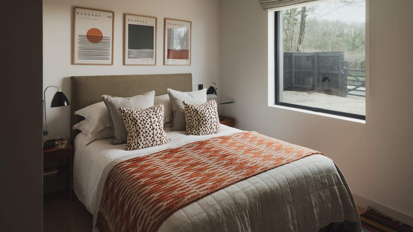 Meanwhile, a pretty third bedroom enjoys a king size bed