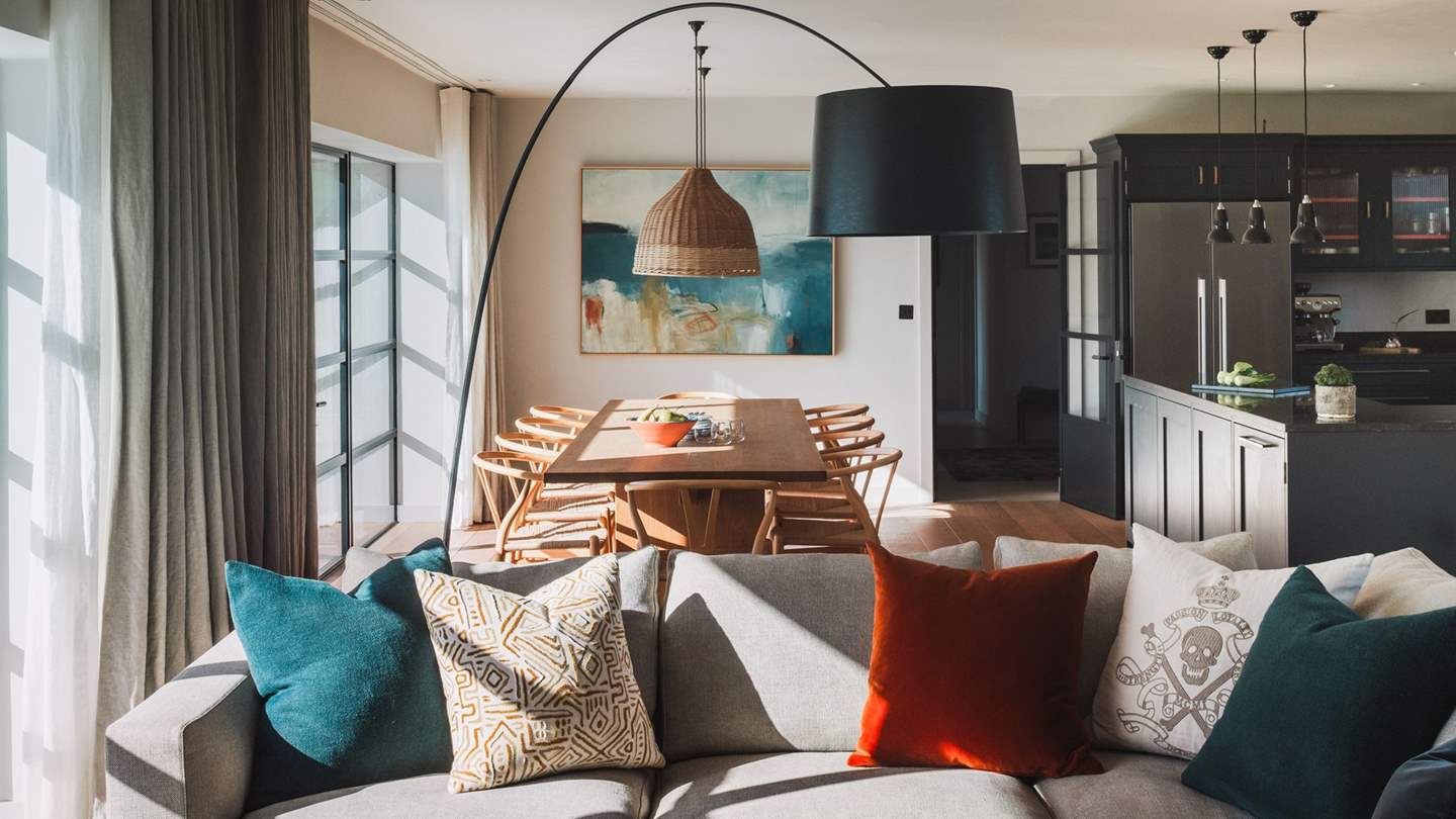 Relax into the sumptuous Minotti L-shaped sofa or vintage mid-century armchairs 