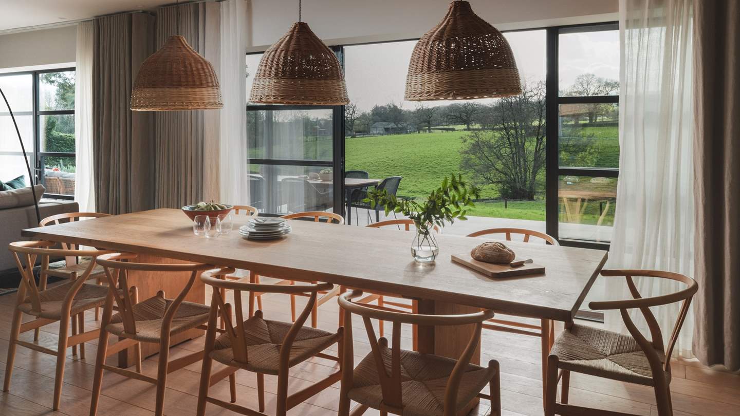 Inside this thoughtfully renovated homestay, modern-luxe style complements large expanses of glass for a taste of indoor-outdoor living