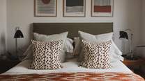 Swathed in luxurious cushions and throws 