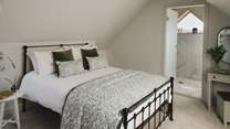 Promising blissful repose, the second bedroom is home to a comfortable double bed