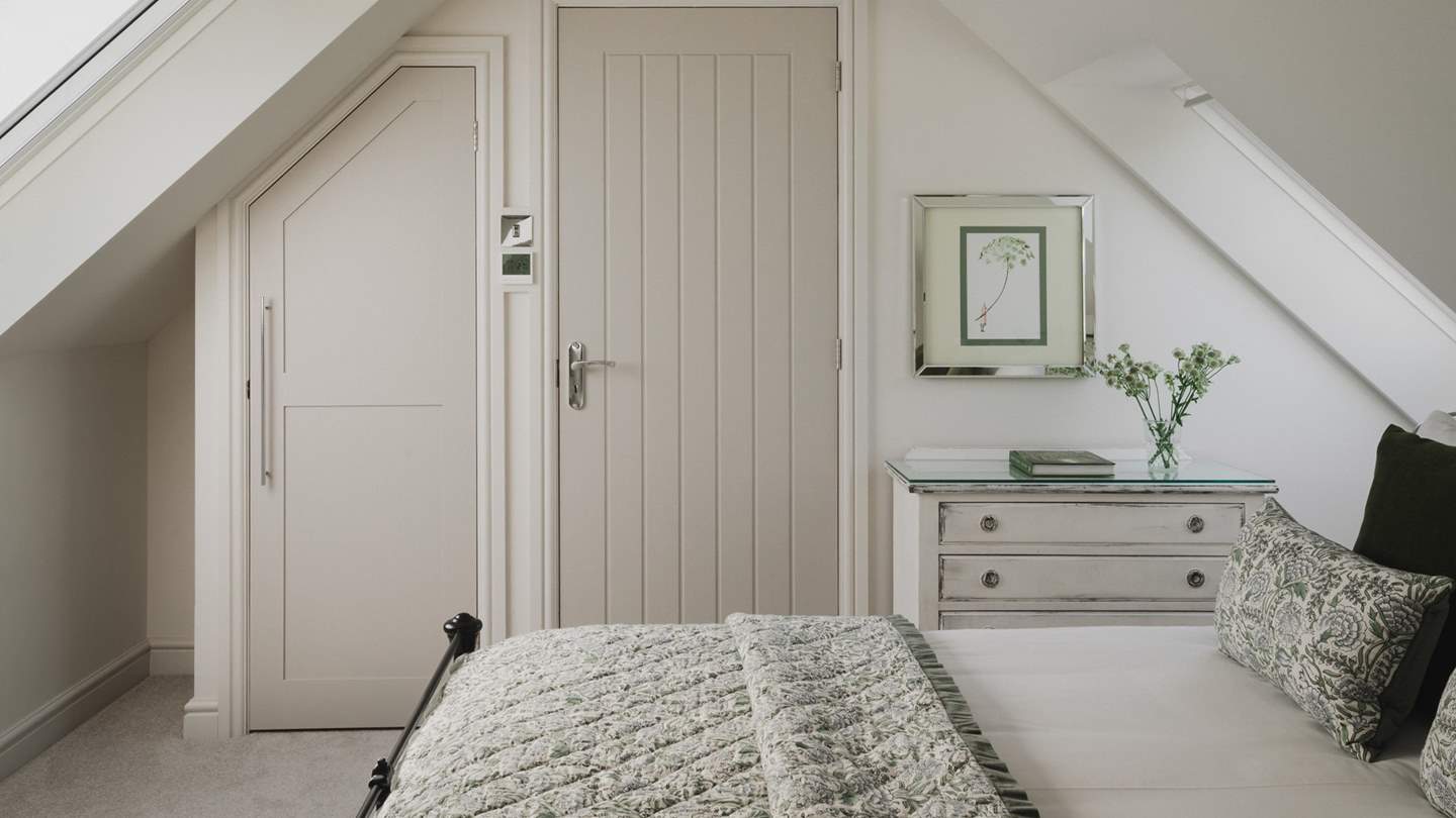For stowing belongings there’s a built-in wardrobe and chest of drawers