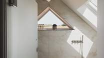 Mirroring the uniqueness of the first ensuite, the second wet room is designed for restorative luxury