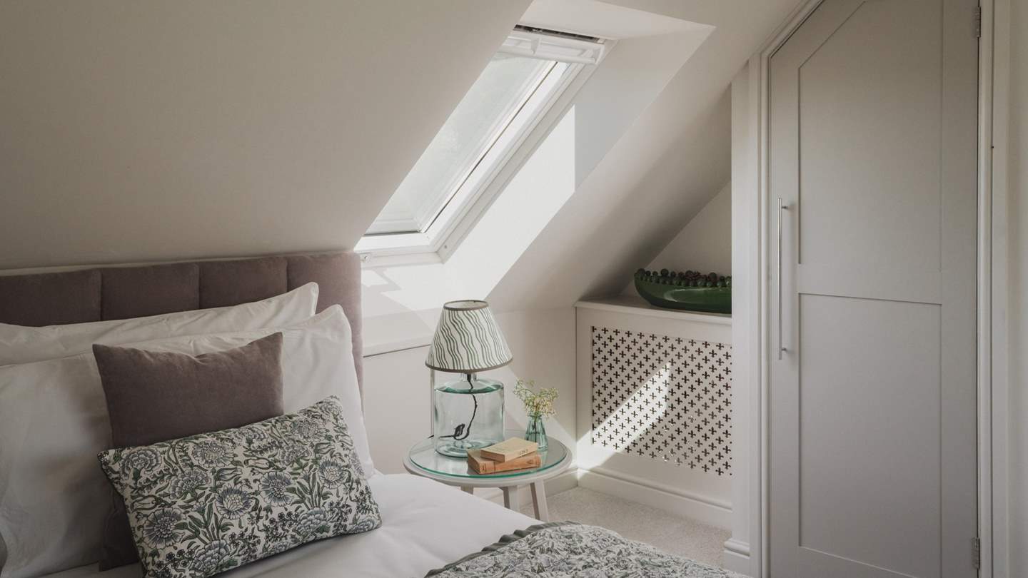 For stowing belongings, there’s a built-in wardrobe and chest of drawers