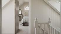 Nestled in the eaves of Lower Gables, discover two light-filled bedrooms