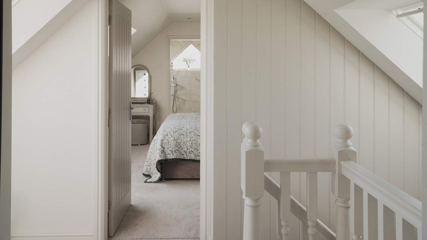 Nestled in the eaves of Lower Gables, discover two light-filled bedrooms
